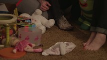 toddler playing with toys 