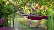 Stunning tropical resort with empty hammock
