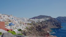 Panoramic view of Santorini island. Panning shot