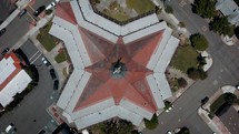 An overhead view of a Catholic Church shaped like a star. 