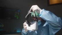 Doctor wears augmented reality headset