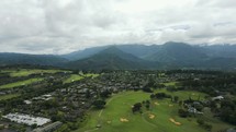 slow motion drone shot flying in Kauai on an overcast day.