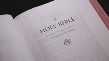 Fade Up and Out on Holy Bible Title Page