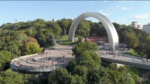 Aerial view of the Friendship of Nations Arch in Kyiv 4k

