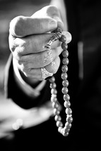 Muslim with Islamic prayer beads