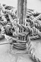 Thick rope tied around a pole.