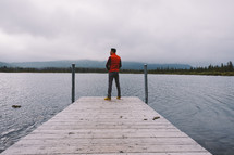 man standing on a dock 