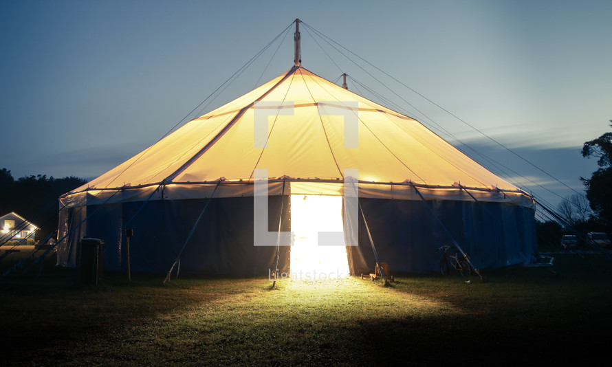 lights shining through a tent issue 