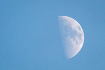 First Quarter Moon in a Blue Sky