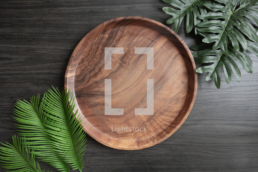 palms and teak plate with palms.