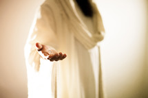 Jesus extending His hand.