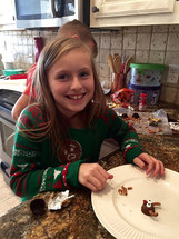 Children making Christmas cookies 