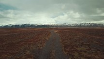 gravel road through Iceland landscape 