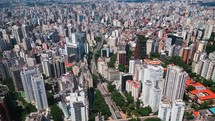Aerial view tracking above the buildings of Sao Paulo shot in 4K. Sao Paulo. Brazil.
