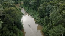 Aerial shot of a boat on the Amazon River.