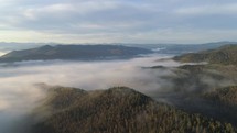 Aerial panorama over Foggy Mountain Landscape