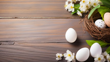 Nest full of Easter eggs on a wooden table 
