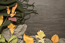 fall leaves on a green scarf  
