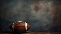 Dirty football on grunge background