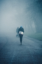 pedestrians walking on a foggy street in Glasgow 