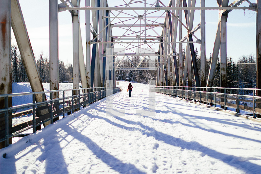 A snow covered bridge.