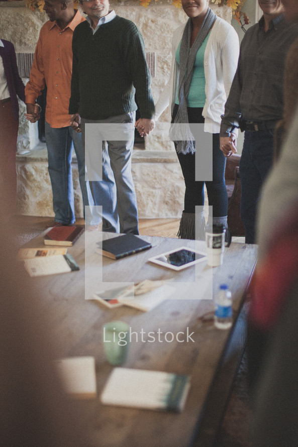group prayer at a Bible study 