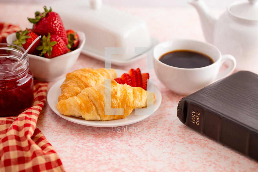 strawberries, croissants, and Bible 