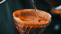 pouring slow brewing coffee 