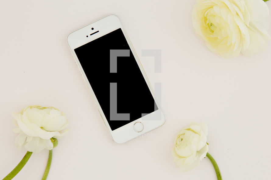 iPhone and white flowers 