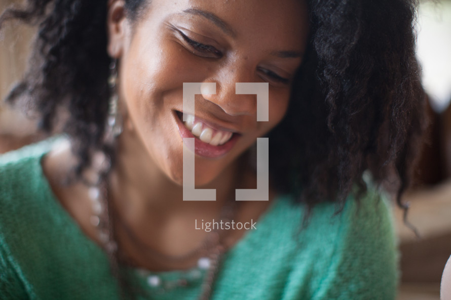 An African American woman smiling 