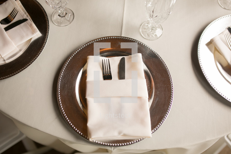place setting on a table at a wedding reception 