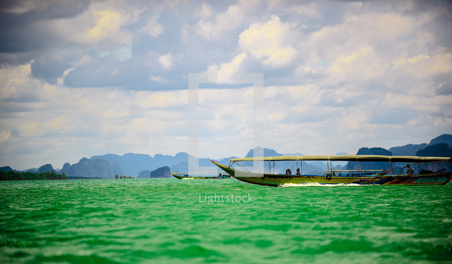 boat on green water 