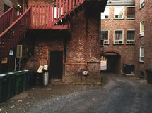alley with brick buildings 