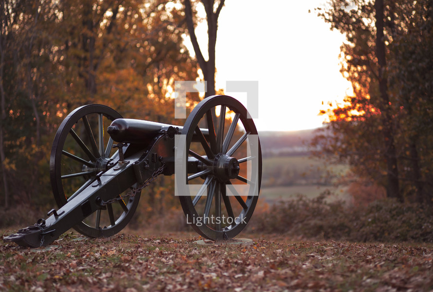 antique cannon in fall 