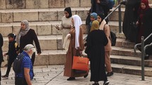 Muslim women walking in middle eastern city