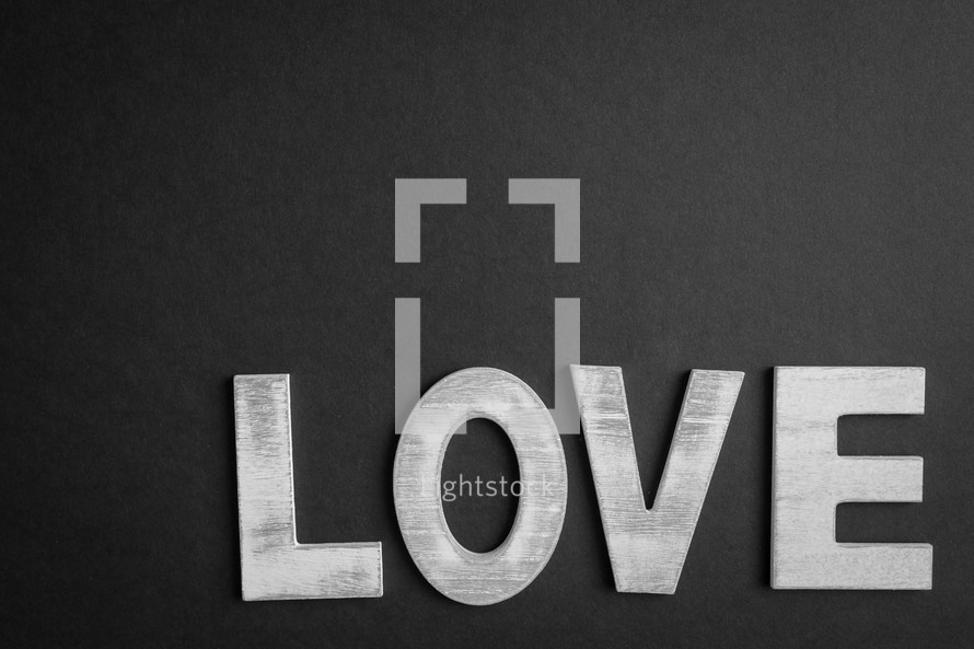 Black background with the word love