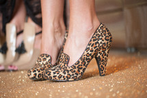 Woman's cheetah high-heeled shoes.