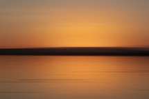 Smooth Orange Sunset on Water