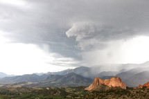 storm clouds over Colorado Springs and Gray rock at Garden of the Gods