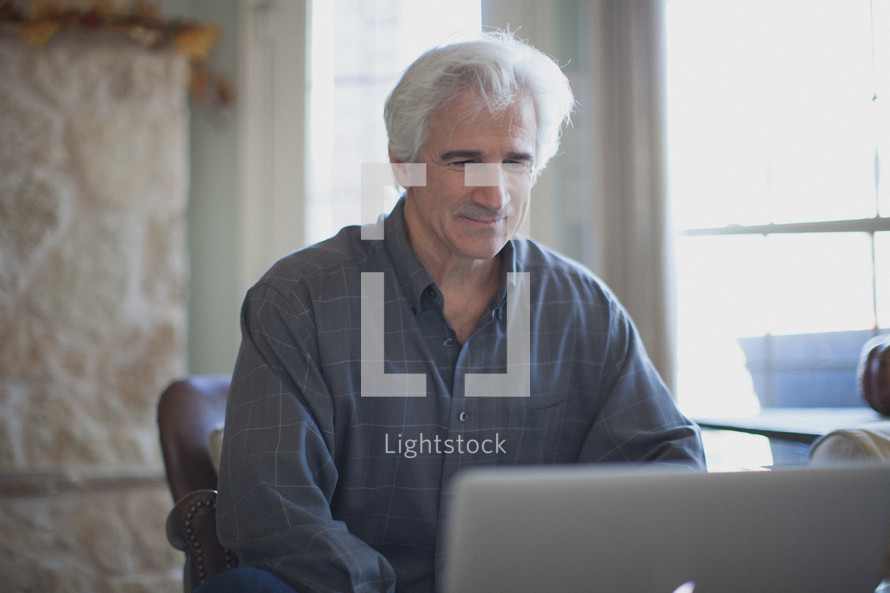 man working at a laptop