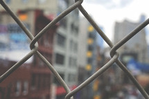 chain link fence and view of buildings 