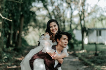 portrait of a bride and groom in a jungle 
