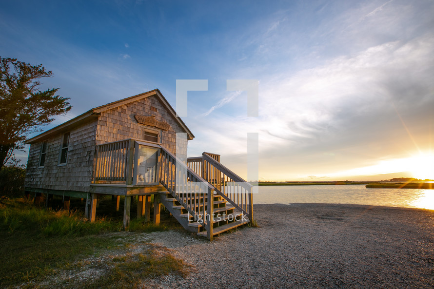 Side view of small wooden naturalist shack on the shore of Assateague Island, Maryland
