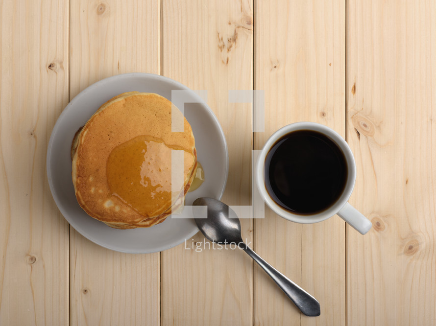 fresh pancakes with a cup of coffee