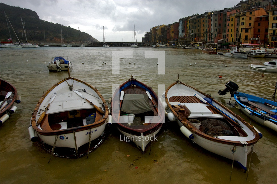 boats docked on an Italian coastline 