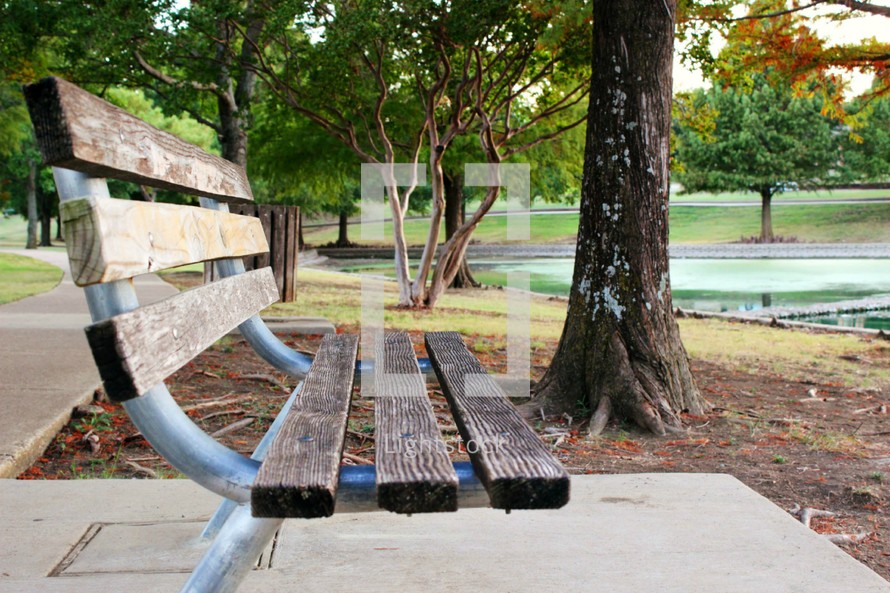 a park bench near a lake 