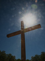sunburst above a cross