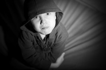 young boy with attitude in a hoodie