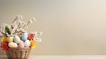 Basket with Easter eggs and flowers