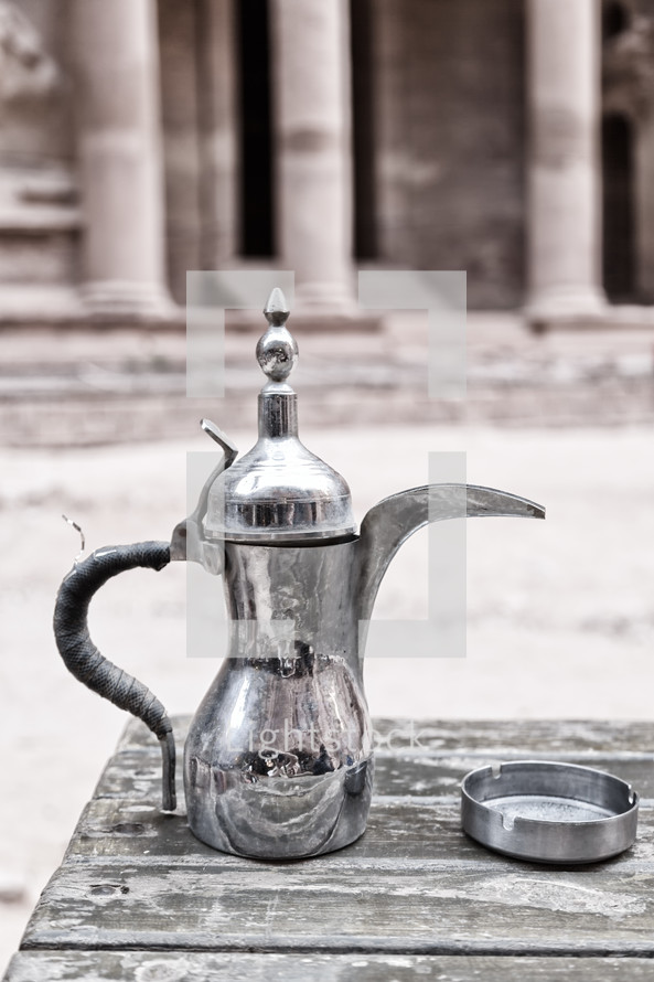 silver tea pot and ash tray 